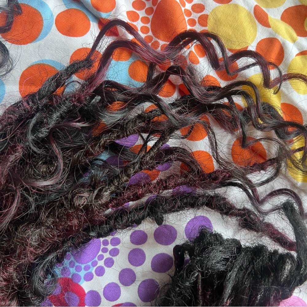 23 inch Boho human hair faux locs red and black.